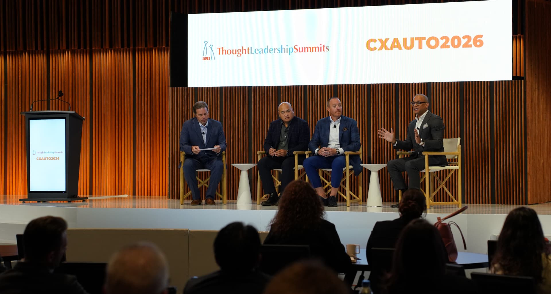A CXAUTO2026 panel discussion on stage