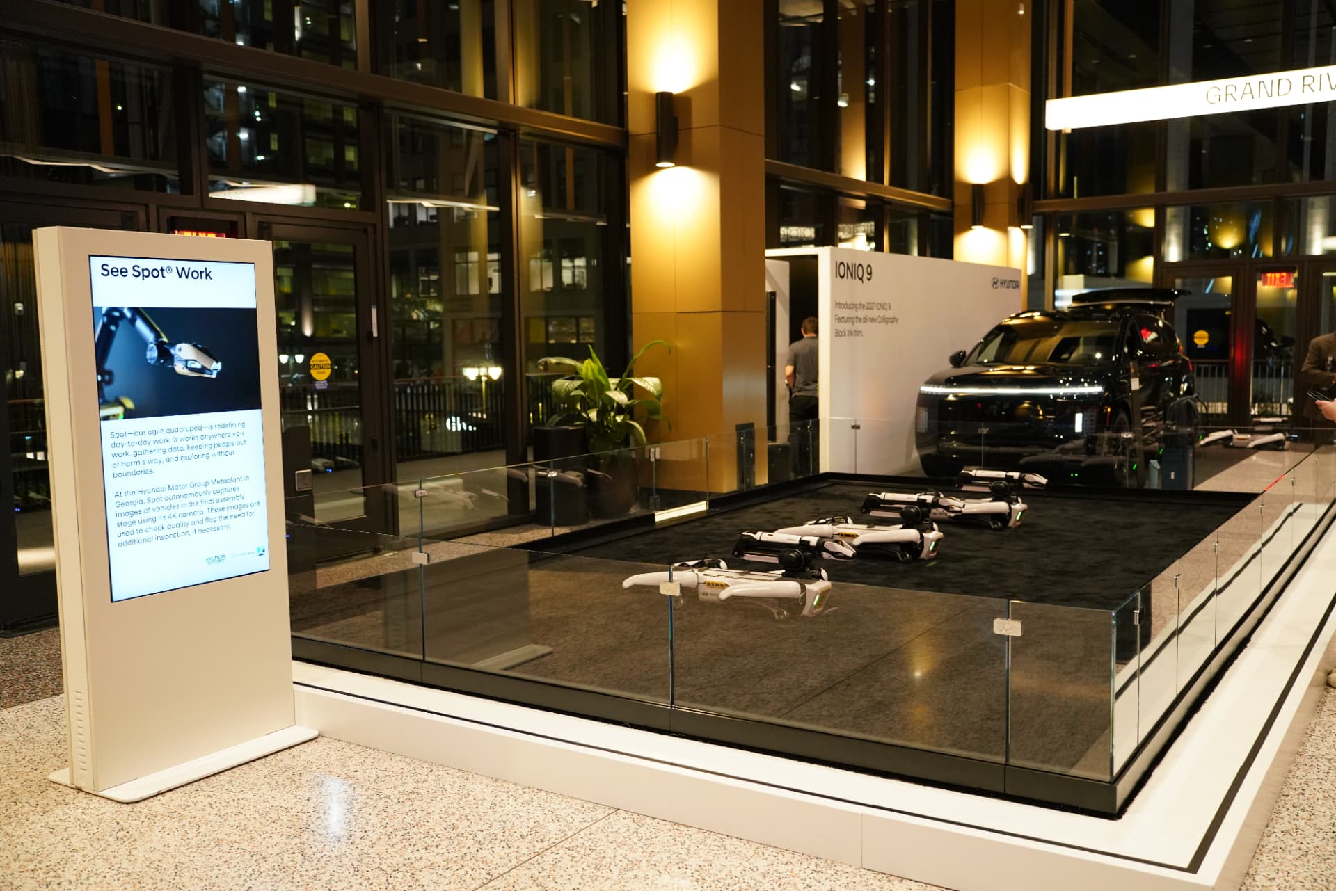 Hyundai’s IONIQ 9 and Boston Dynamics’ Spot robots on the event floor